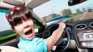 Driver-excuses-scared-woman-driving-car
