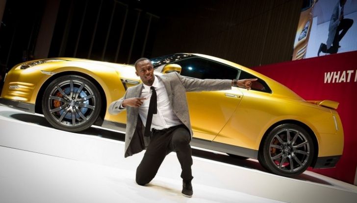 Usain Bolt, 6 volte medaglia d’oro alle Olimpiadi, sfida il fuoco - Foto 1 di 9